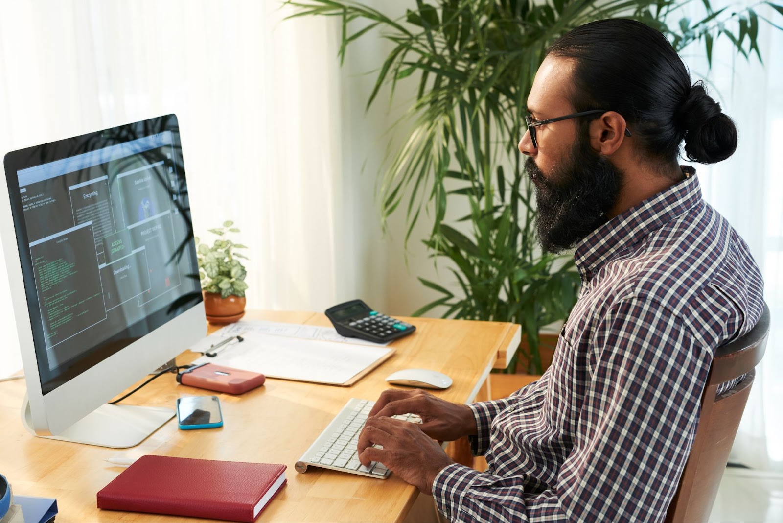 Man working with code in the office